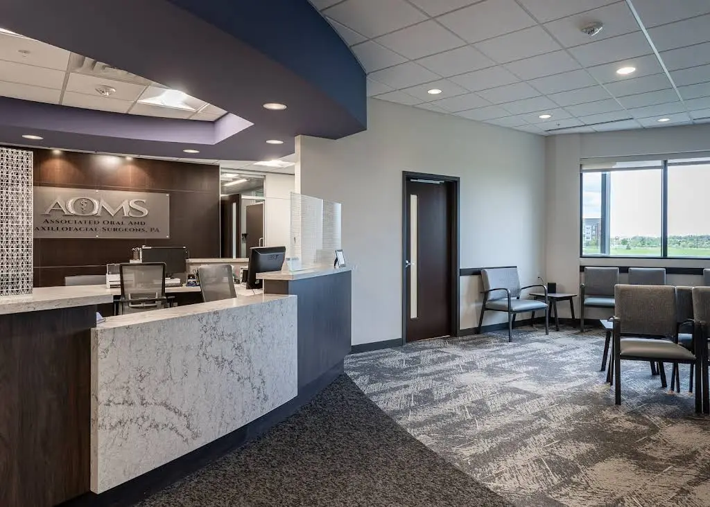 Associated Oral & Maxillofacial Surgeons - Professional dental clinic exterior with modern facilities