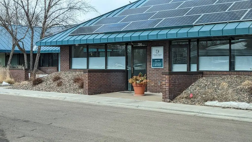 Natural Smiles Dental Care - Professional dental clinic exterior with modern facilities