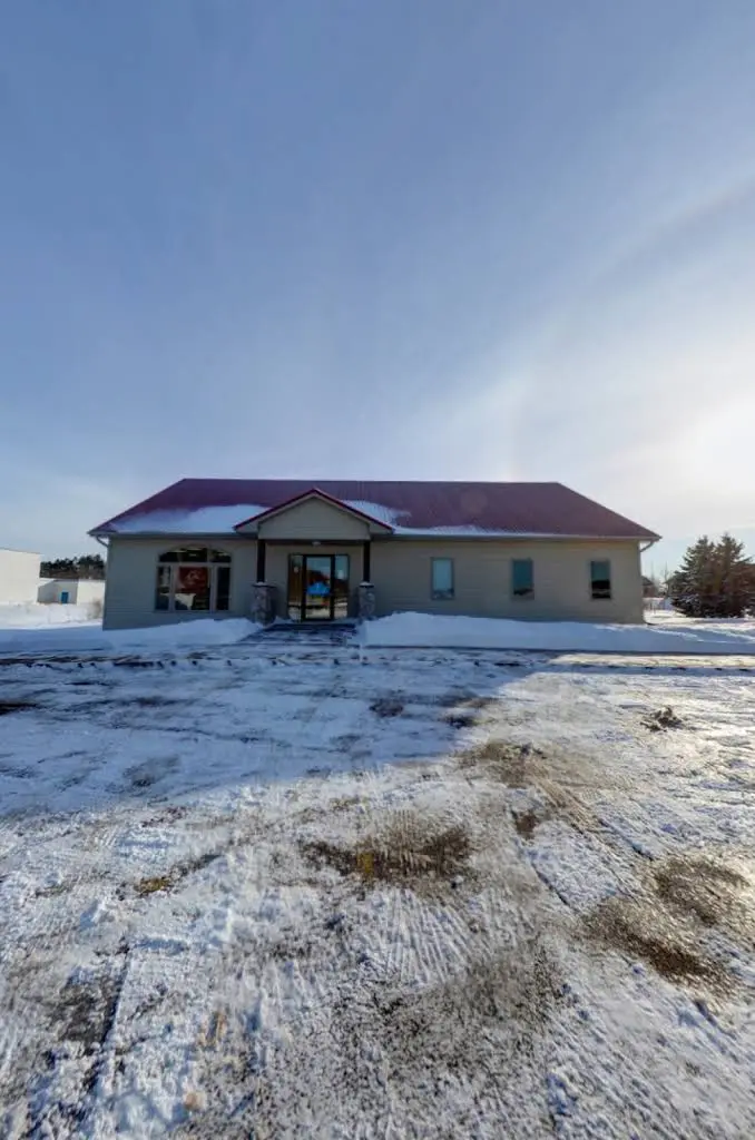 Veneman Dental Care - Professional dental clinic exterior with modern facilities