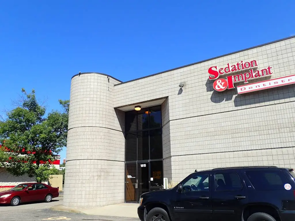 Sedation & Implant Dentistry - Professional dental clinic exterior with modern facilities