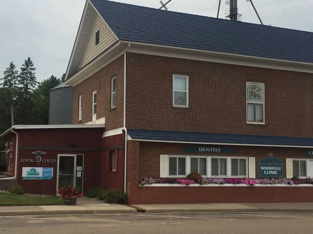 Veneman Dental Care - Professional dental clinic exterior with modern facilities