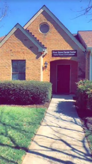 River Stone Dental Center - Professional dental clinic exterior with modern facilities