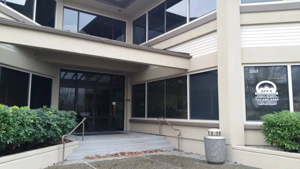 APEX Dental Care - Professional dental clinic exterior with modern facilities