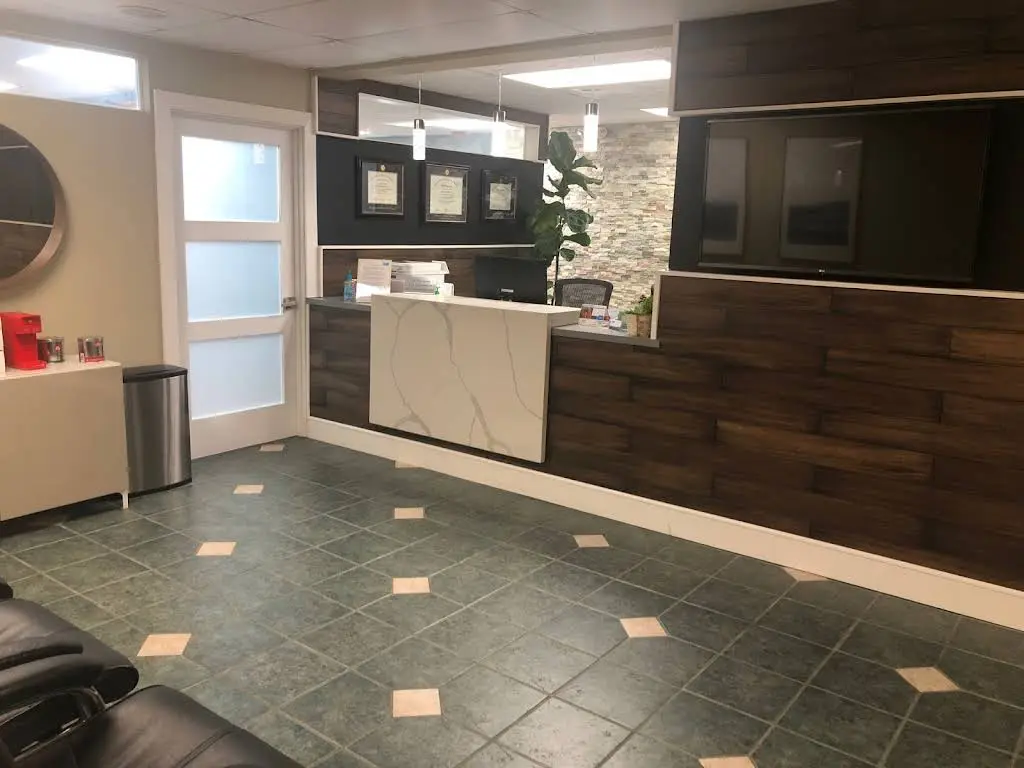 Sunrise Dental Monroe - Professional dental clinic exterior with modern facilities