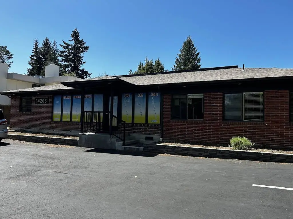 Caring Hands Dental - Professional dental clinic exterior with modern facilities
