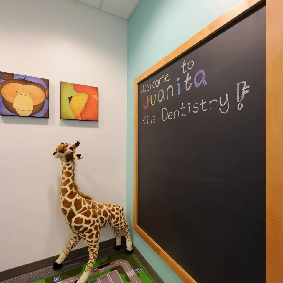 Juanita Kids Dentistry - Professional dental clinic exterior with modern facilities