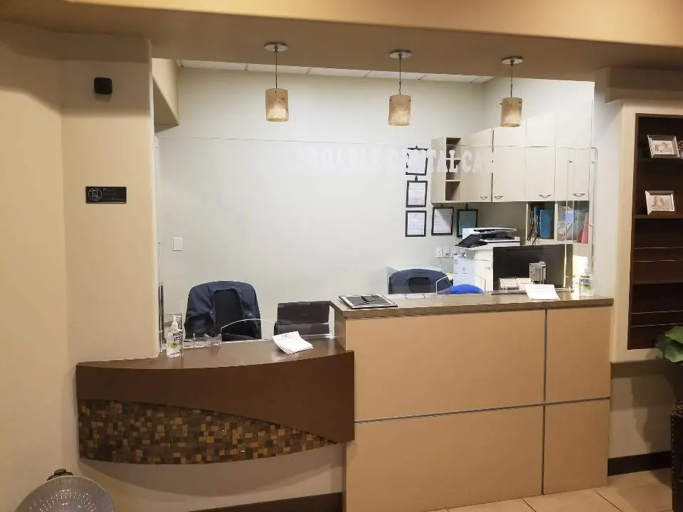 Affordable Dental Care - Professional dental clinic exterior with modern facilities