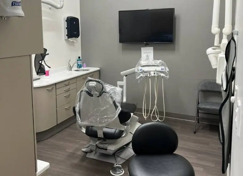 Precision Dental Care - Professional dental clinic exterior with modern facilities