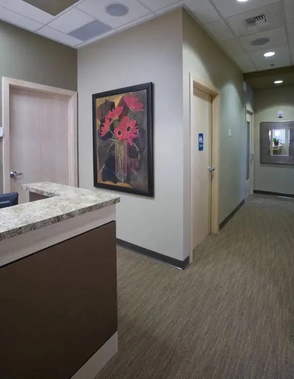 Sunny E. Kim DDS - Professional dental clinic exterior with modern facilities