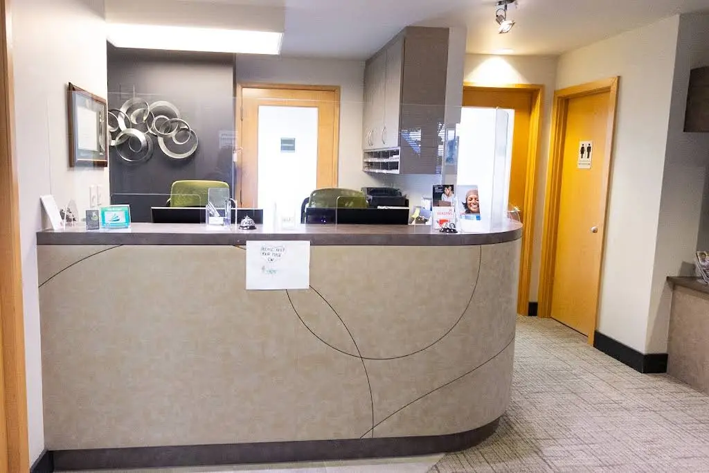 Krumly Dental Care - Professional dental clinic exterior with modern facilities