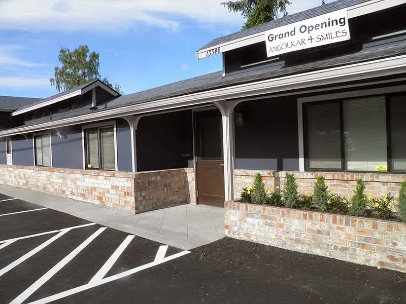 Angolkar4Smiles Orthodontics - Professional dental clinic exterior with modern facilities