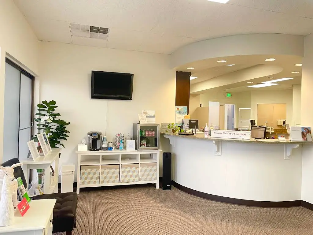 Blooming Dental - Implant & Prosthodontics - Professional dental clinic exterior with modern facilities