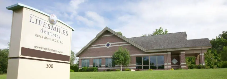 LifeSmiles Complete Health Dentistry - Professional dental clinic exterior with modern facilities