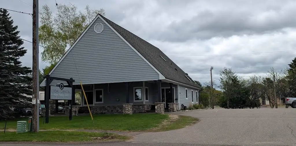Ideal Dental - Alex Flora, DDS - Professional dental clinic exterior with modern facilities