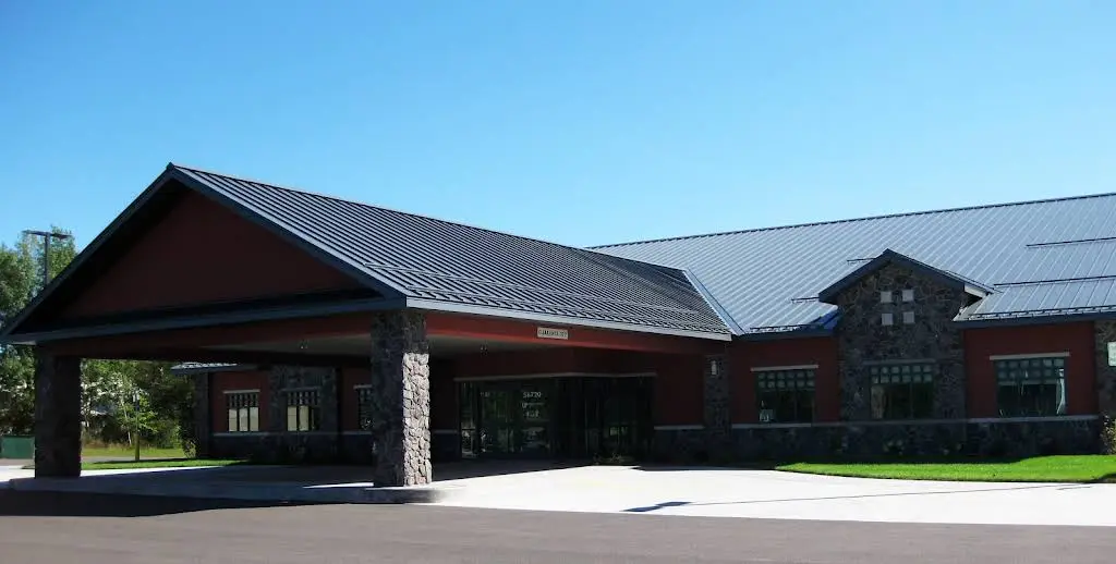 Upper Great Lakes Family Health Center - Professional dental clinic exterior with modern facilities