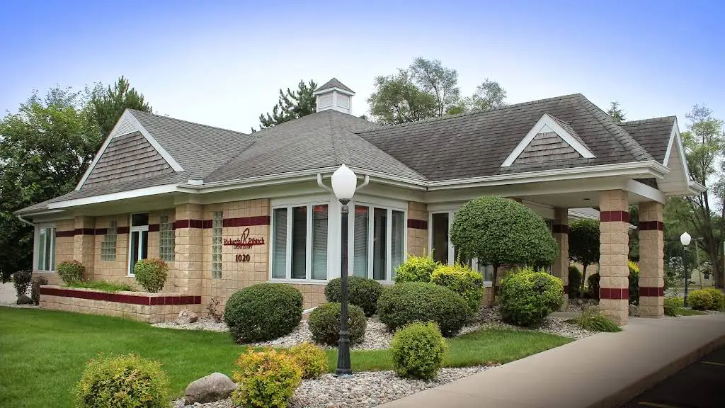 Mid Michigan Smiles: Raymond Ribitch, DDS - Professional dental clinic exterior with modern facilities