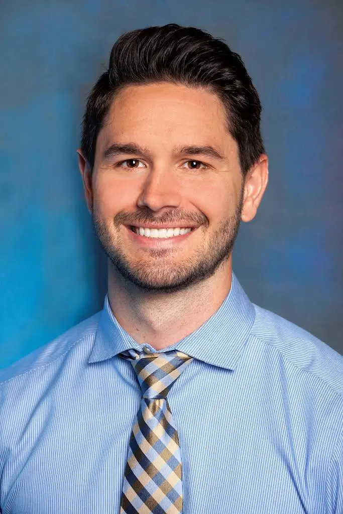 Dr. John Orthodontics - Professional dental clinic exterior with modern facilities
