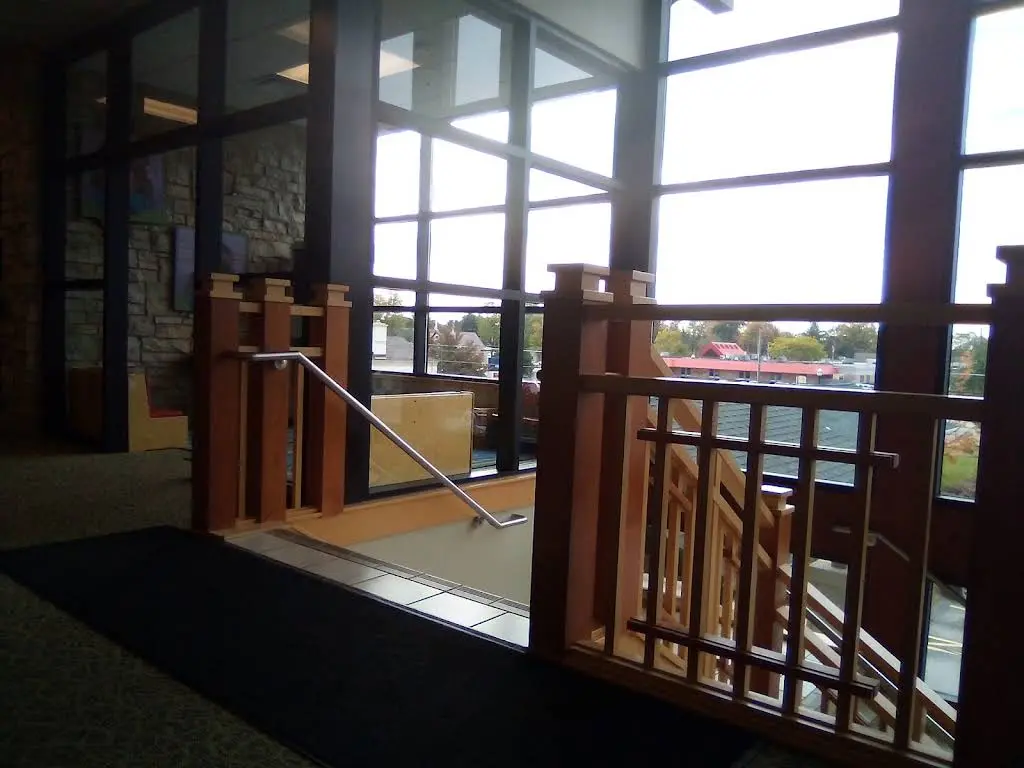 Family Health Care - White Cloud Dental Clinic - Professional dental clinic exterior with modern facilities