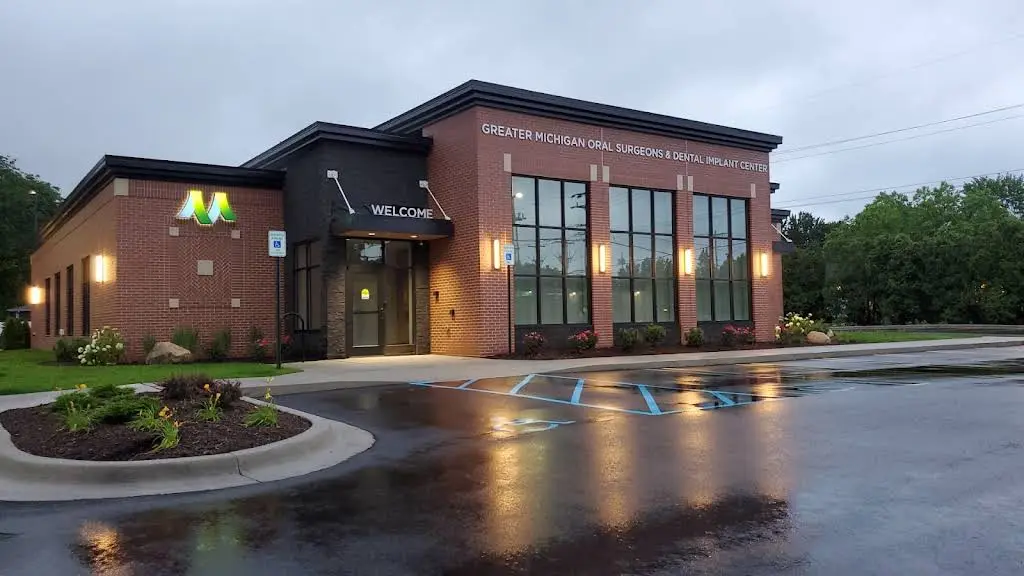 Greater Michigan Oral Surgeons & Dental Implant Center - Professional dental clinic exterior with modern facilities