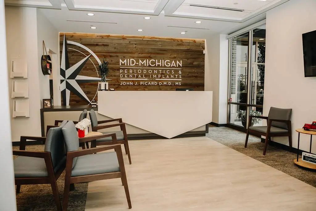Mid-Michigan Periodontics & Dental Implants - Professional dental clinic exterior with modern facilities