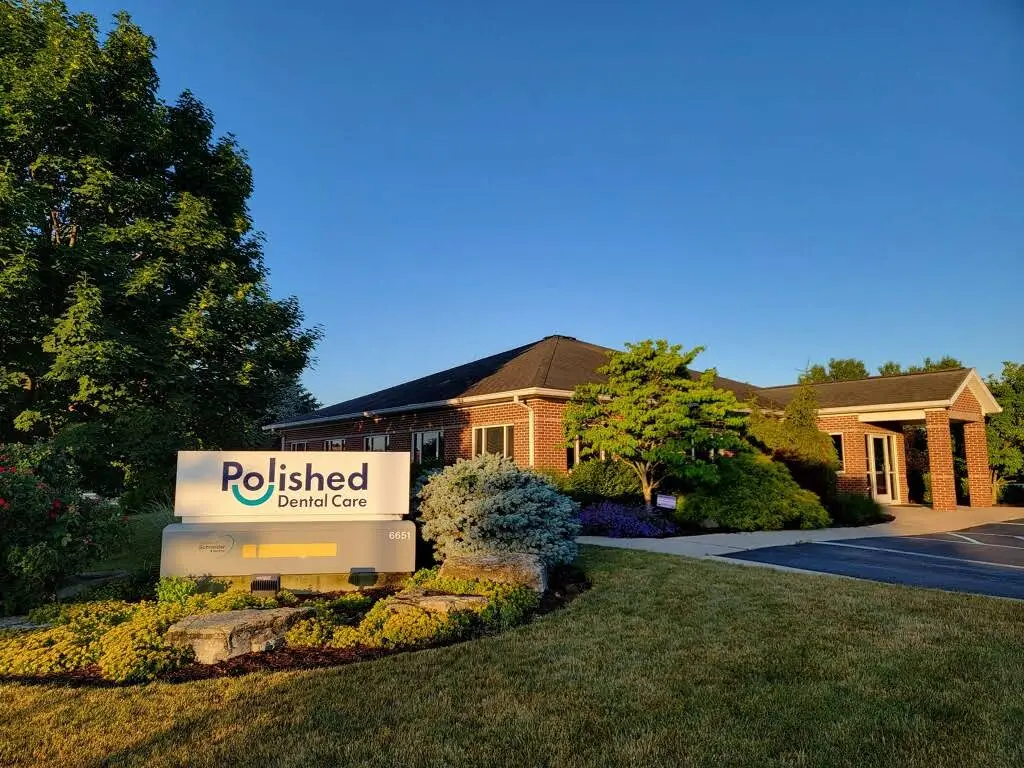 Polished Dental Care - Professional dental clinic exterior with modern facilities