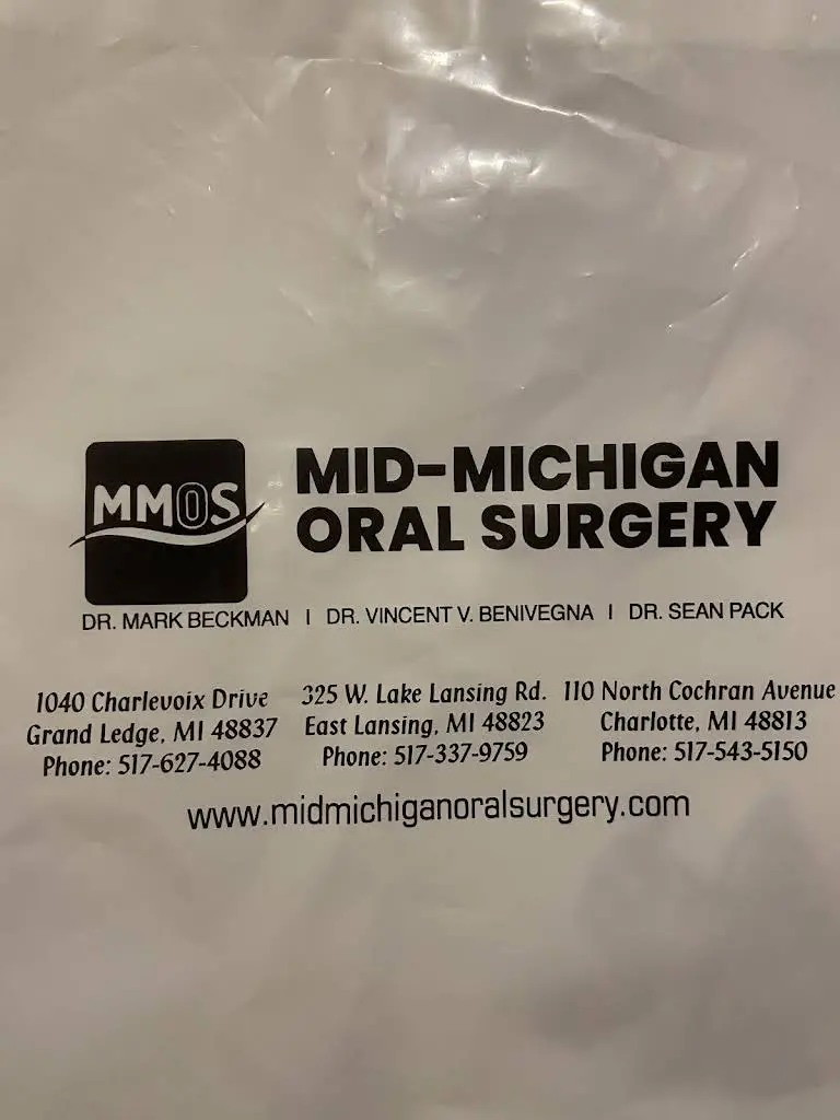 Mid-Michigan Oral Surgery - Professional dental clinic exterior with modern facilities