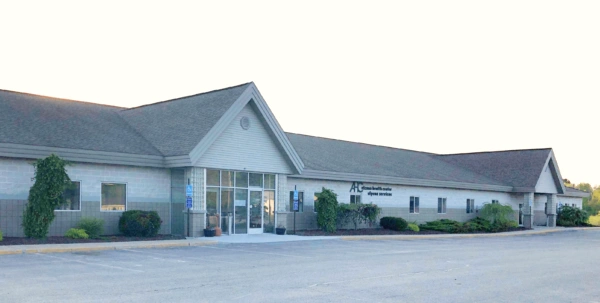 Alcona Health Center - Alpena - Professional dental clinic exterior with modern facilities