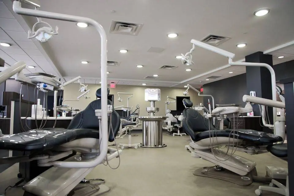 Family Health Center - Alcott Dental - Professional dental clinic exterior with modern facilities