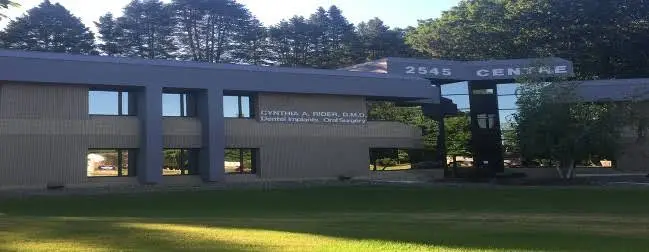 Rider Oral Surgery - Professional dental clinic exterior with modern facilities