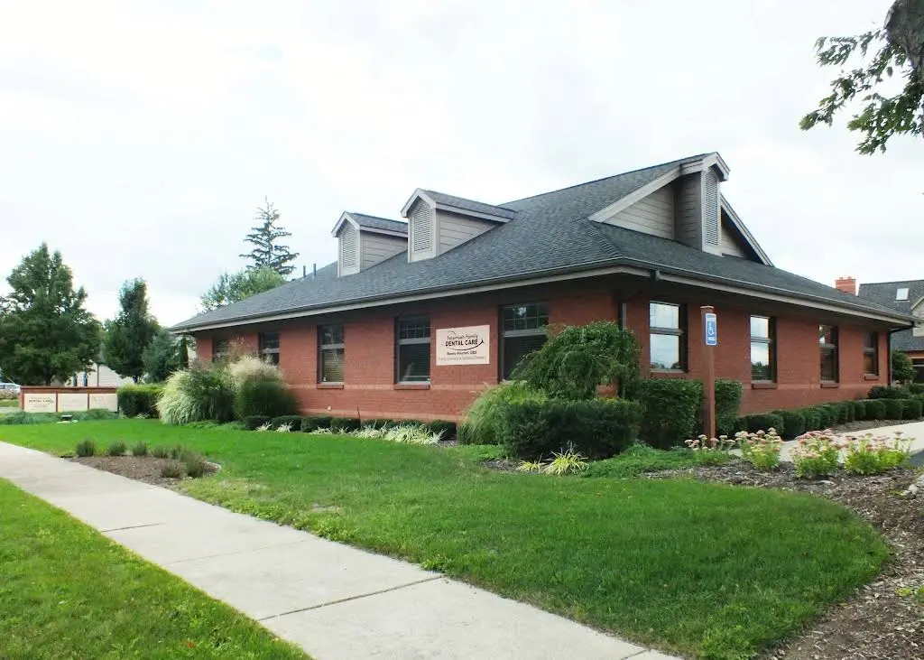 Tecumseh Family Dental Care - Professional dental clinic exterior with modern facilities