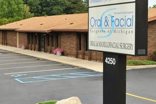 Oral and Facial Surgeons of Michigan - Professional dental clinic exterior with modern facilities