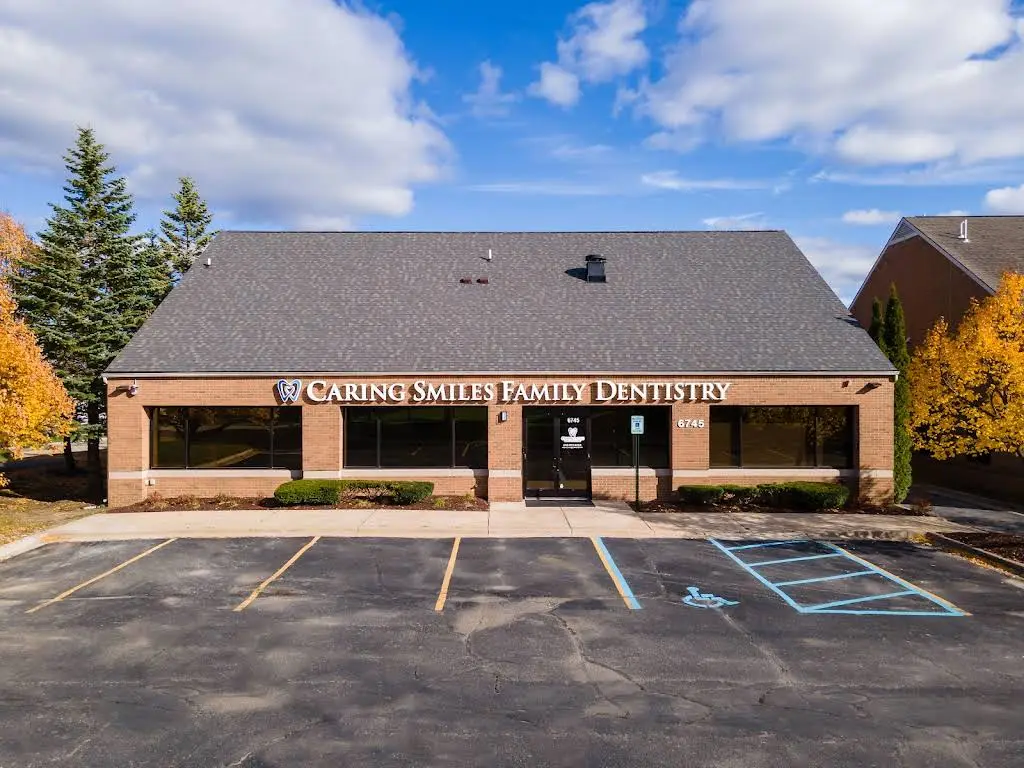 Caring Smiles Family Dentistry, PC - Professional dental clinic exterior with modern facilities