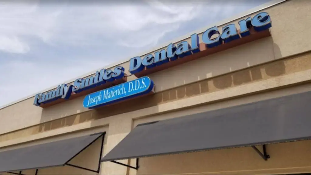 Family Smiles Dental Care - Professional dental clinic exterior with modern facilities