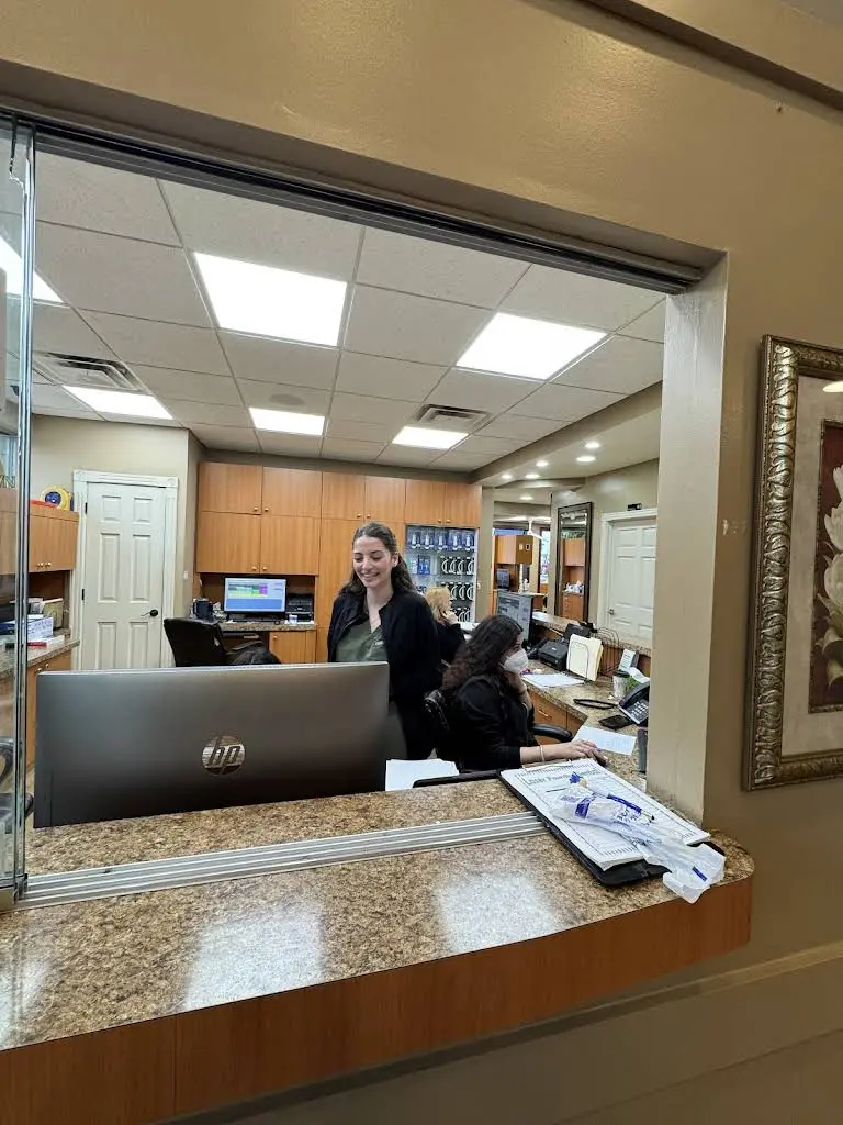 Laser Family Dental / Dental Implant Center of MI - Professional dental clinic exterior with modern facilities