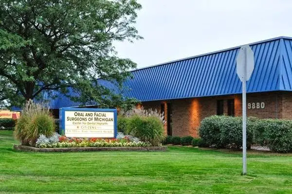 Oral and Facial Surgeons of Michigan - Professional dental clinic exterior with modern facilities