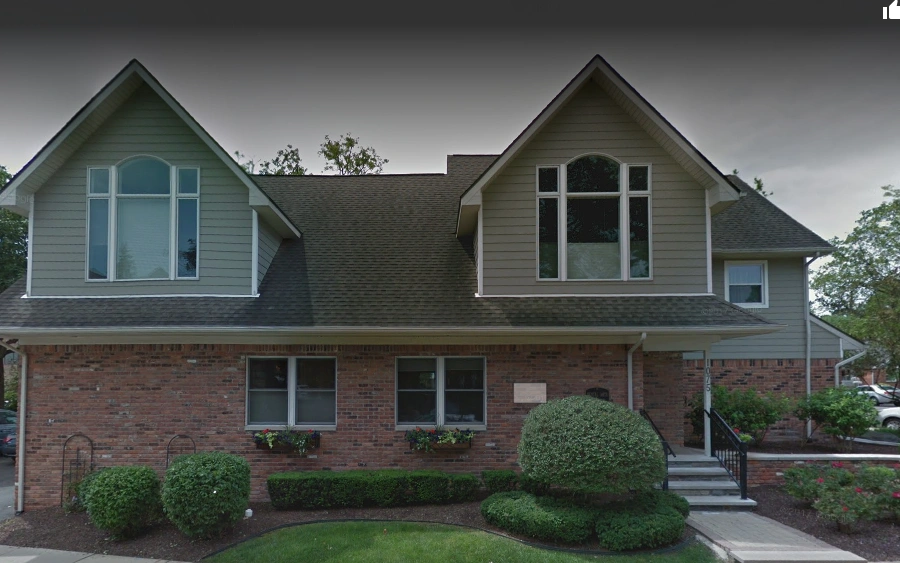 Dental Arts / Premier Smiles - Professional dental clinic exterior with modern facilities