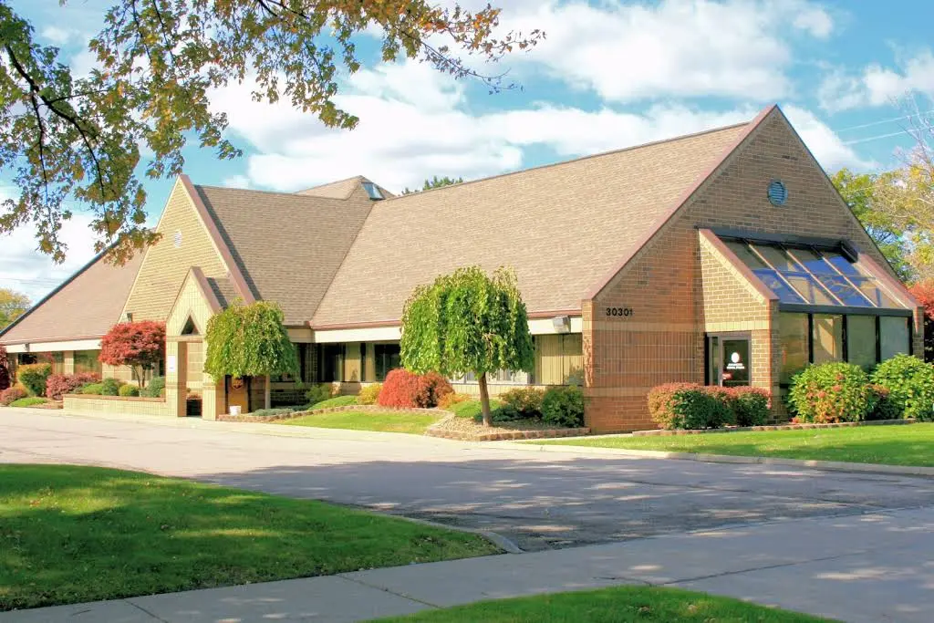 Your Neighborhood Dentist - Professional dental clinic exterior with modern facilities