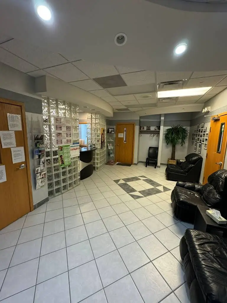 Renata Olejnik DDS - Professional dental clinic exterior with modern facilities