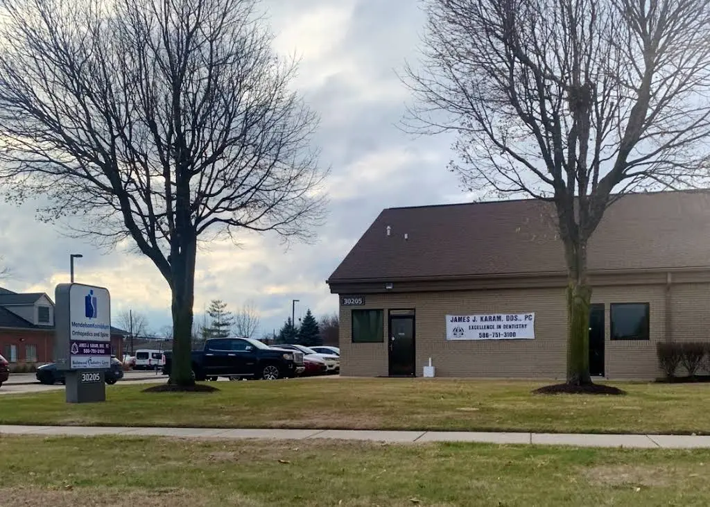 James J. Karam, DDS PC - Professional dental clinic exterior with modern facilities