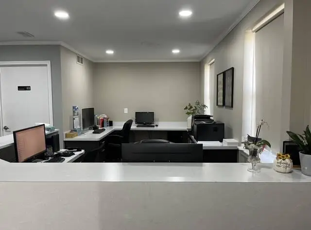 Sunshine Dental Implant and Periodontics - Professional dental clinic exterior with modern facilities