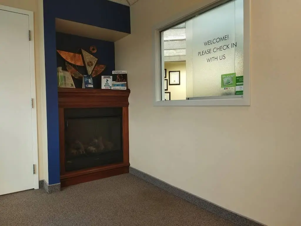 Light Touch Dental Care - Professional dental clinic exterior with modern facilities