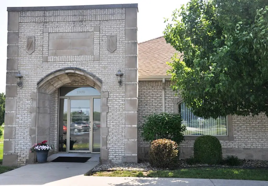 Howard County Oral & Maxillofacial Surgeons - Professional dental clinic exterior with modern facilities