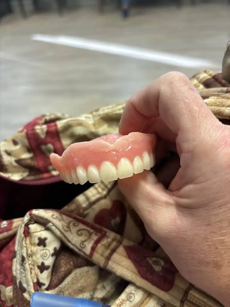 Affordable Dentures & Implants - Professional dental clinic exterior with modern facilities