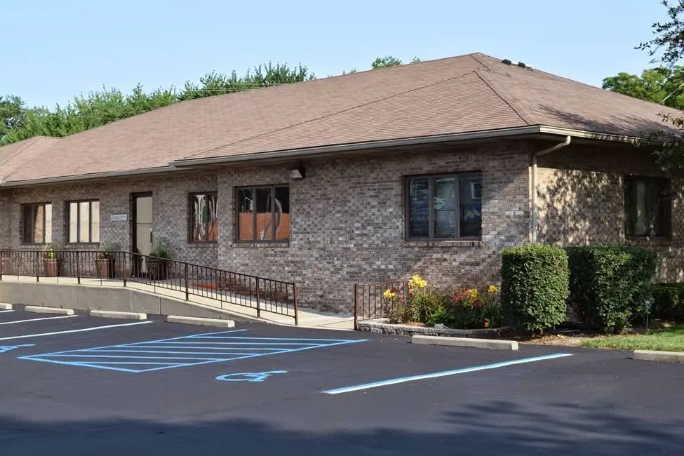 Signature Smiles by Dr. Mike Schweizer - Professional dental clinic exterior with modern facilities