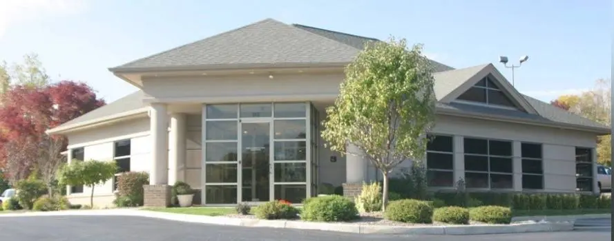 Espeleta Dental - Professional dental clinic exterior with modern facilities
