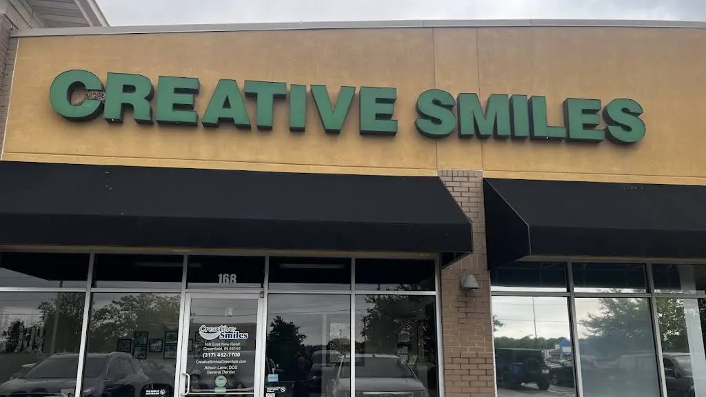 Creative Smiles - Professional dental clinic exterior with modern facilities