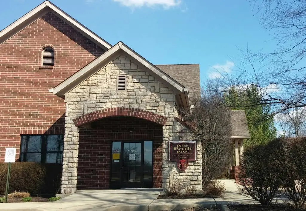 Dennis Pettit, DDS Oral & Maxillofacial Surgery - Professional dental clinic exterior with modern facilities
