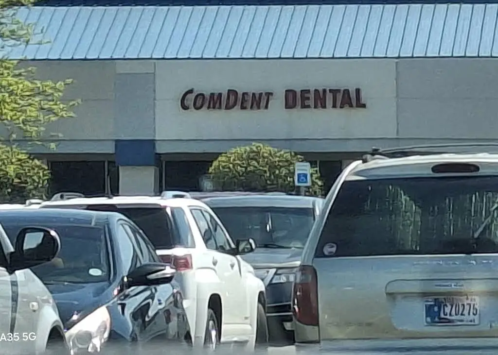 Comdent Dental Services - Professional dental clinic exterior with modern facilities