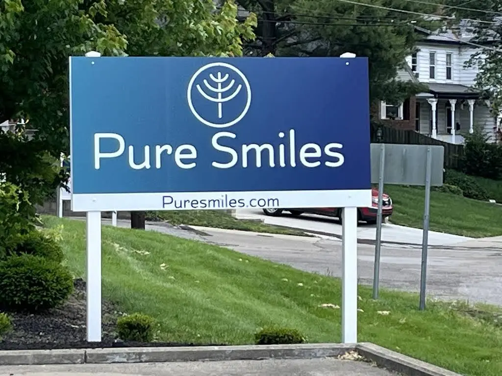 Pure Smiles - Western Hills - Professional dental clinic exterior with modern facilities