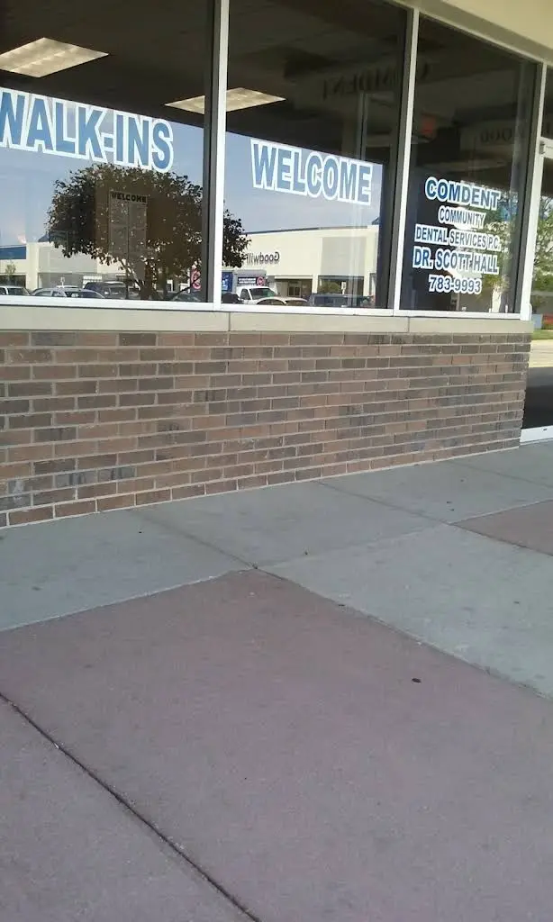 Comdent Dental / Hall Family Dentistry - Professional dental clinic exterior with modern facilities